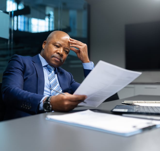 corporate-executive-concerned-work-paper