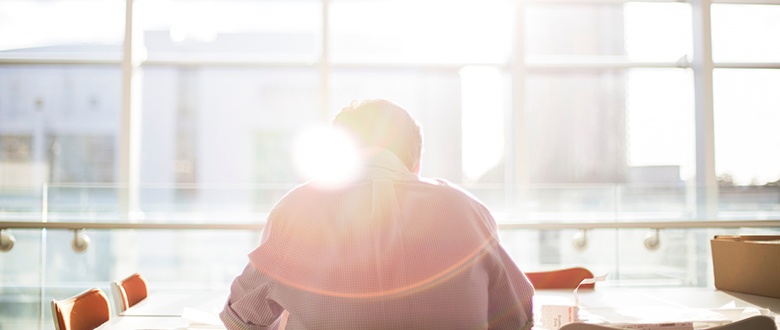 a man sitting in front of a table